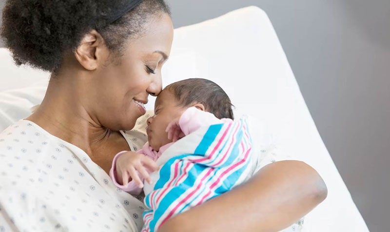 mother holding her newborn